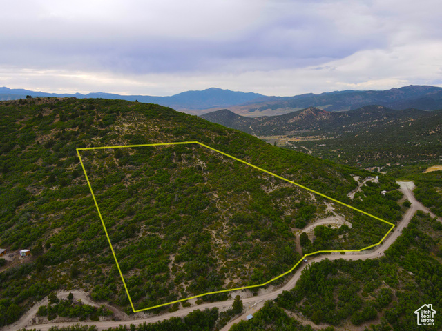 462 South Valleyview, Unit 462 Fairview, UT 84629 - Photo 17 of 38 Aerial view of property and surrounding area with a mountainous background and property boundaries highlighted