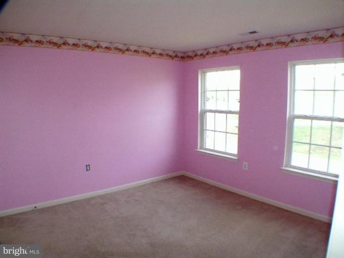 8 Marblehead Road Inwood, WV 25428 - Photo 15 of 18 a view of a room with window and a projector