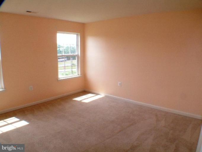 8 Marblehead Road Inwood, WV 25428 - Photo 16 of 18 an empty room with windows