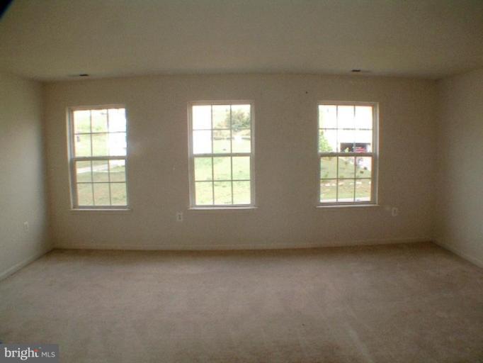 8 Marblehead Road Inwood, WV 25428 - Photo 10 of 18 an empty room with windows