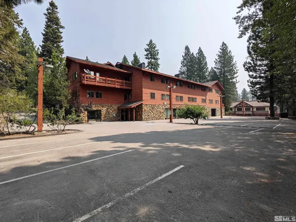 a front view of a house with a outdoor space