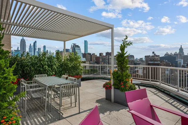 a view of a terrace with sitting area