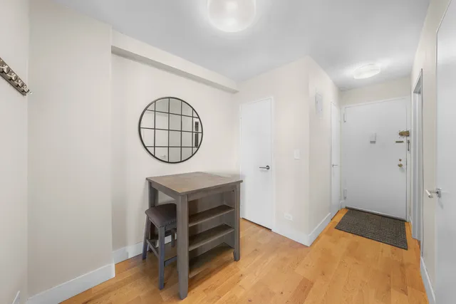 a spacious bedroom with a bed and couch