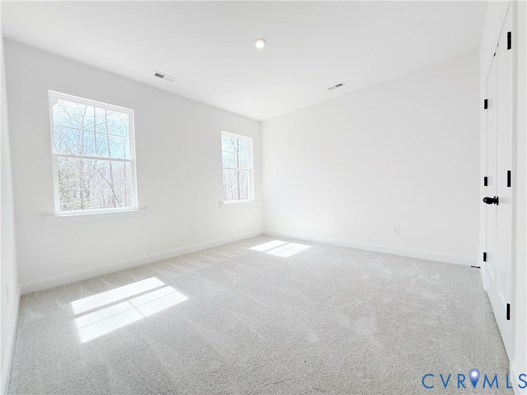 4041 Tredon Road Mechanicsville, VA 23111 - Photo 25 of 35 Bedrooms 2 and 3 with double-door closets share a