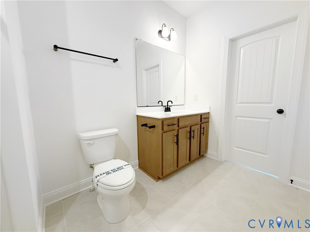 4041 Tredon Road Mechanicsville, VA 23111 - Photo 26 of 35 Bedrooms 2 and 3 with double-door closets share a