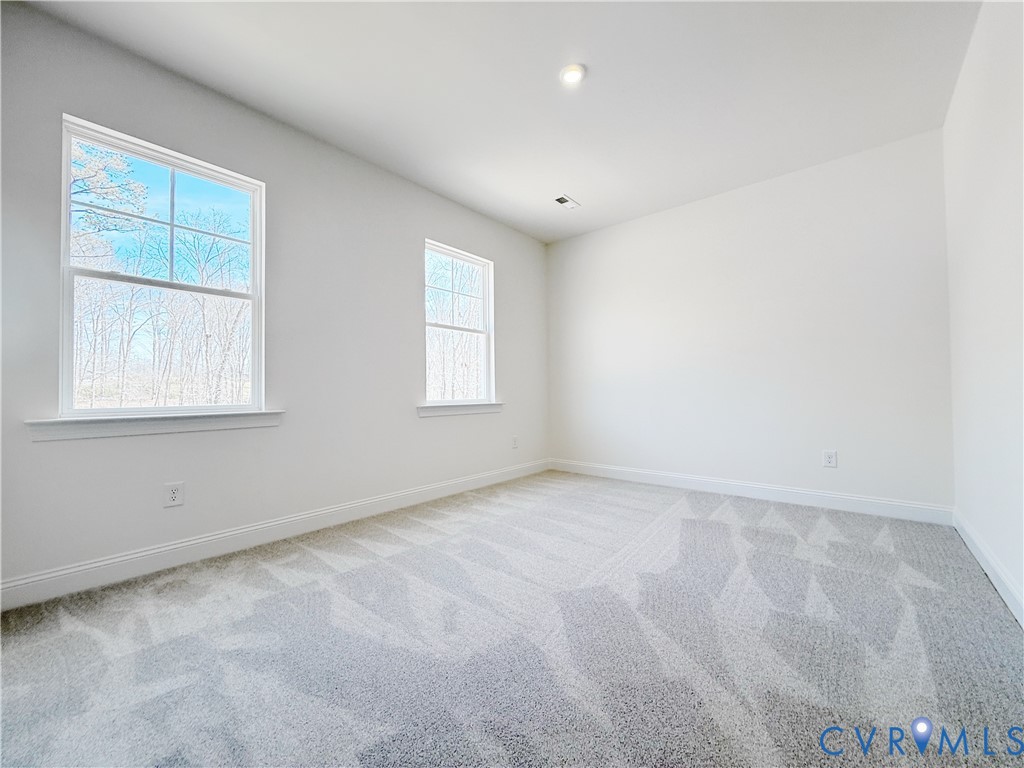 4041 Tredon Road Mechanicsville, VA 23111 - Photo 28 of 35 Bedrooms 2 and 3 with double-door closets share a