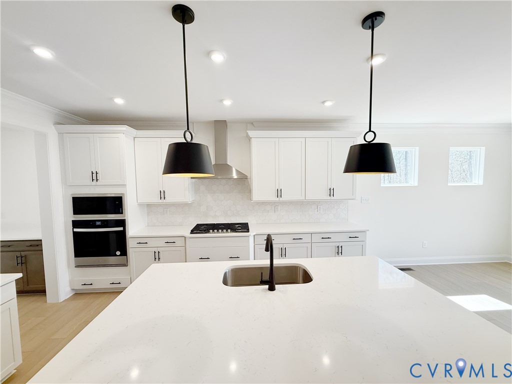 4041 Tredon Road Mechanicsville, VA 23111 - Photo 4 of 35 The first floor offers open-concept living, featur
