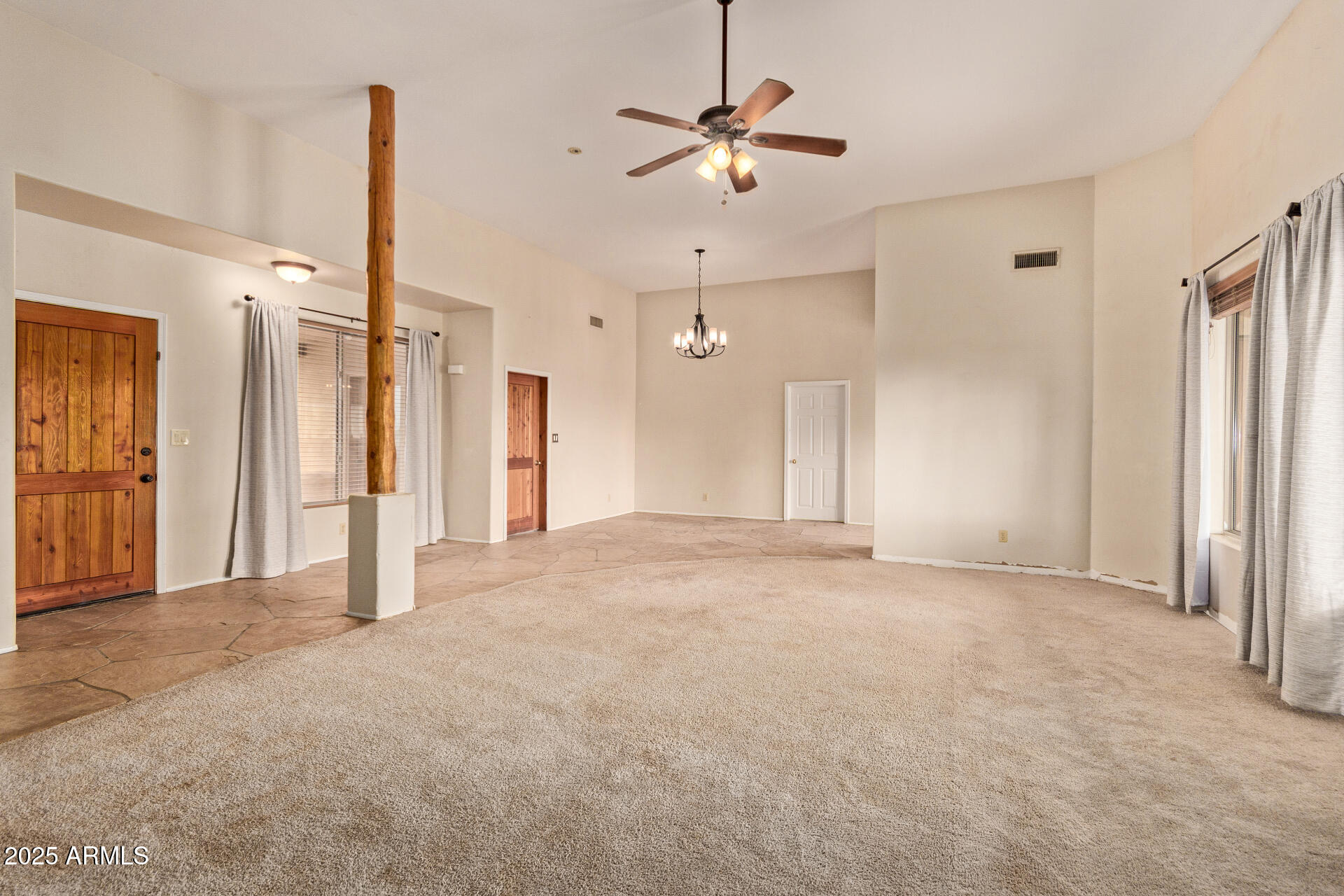 1032 East Carlise Road Phoenix, AZ 85086 - Photo 12 of 56 a view of empty room with ceiling fan