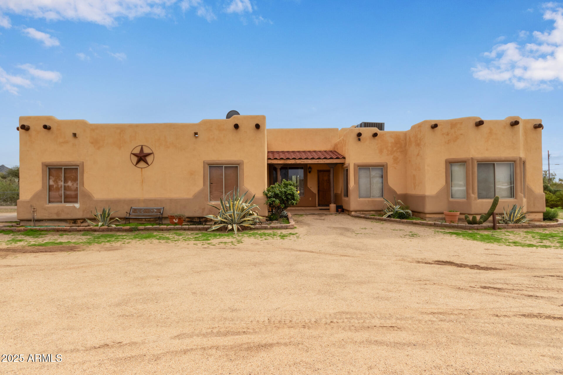 1032 East Carlise Road Phoenix, AZ 85086 - Photo 2 of 56 a view of a house with large space and a big yard