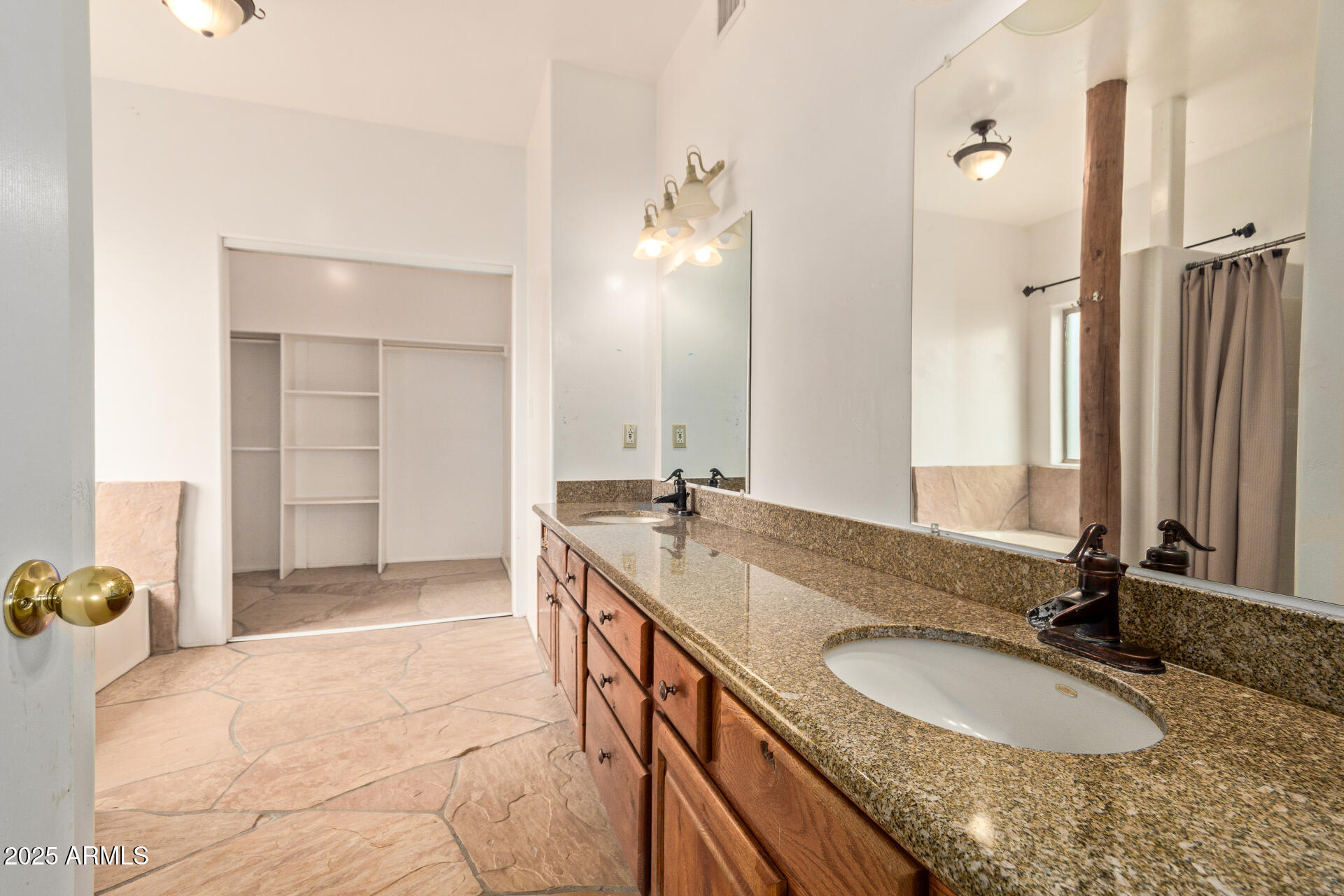 1032 East Carlise Road Phoenix, AZ 85086 - Photo 23 of 56 a bathroom with a granite countertop sink and a mirror