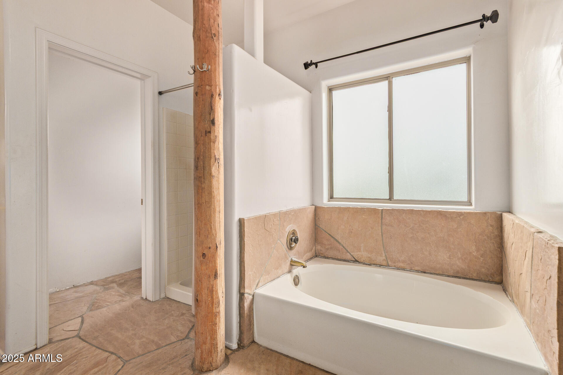 1032 East Carlise Road Phoenix, AZ 85086 - Photo 24 of 56 a bathroom with a bathtub and a shower