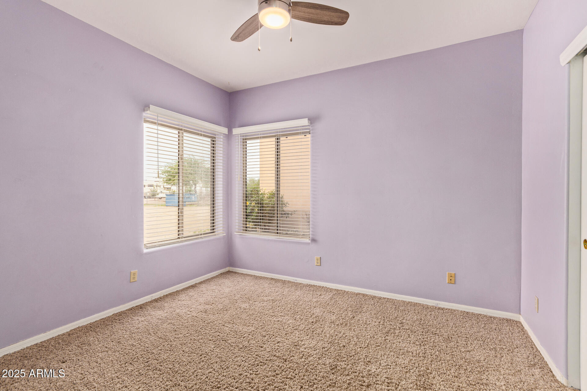 1032 East Carlise Road Phoenix, AZ 85086 - Photo 28 of 56 an empty room with a window