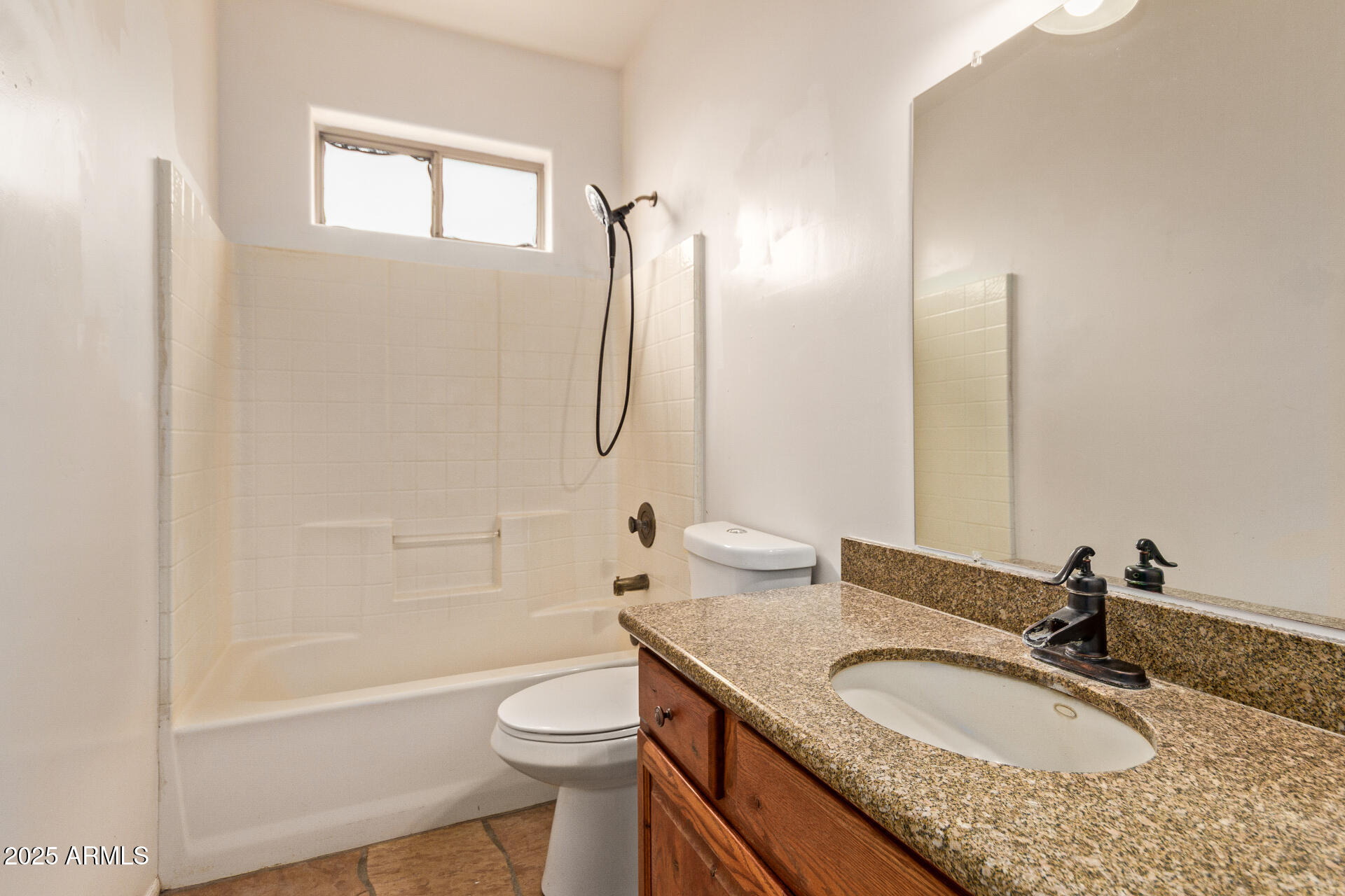1032 East Carlise Road Phoenix, AZ 85086 - Photo 30 of 56 a bathroom with a granite countertop sink toilet and shower
