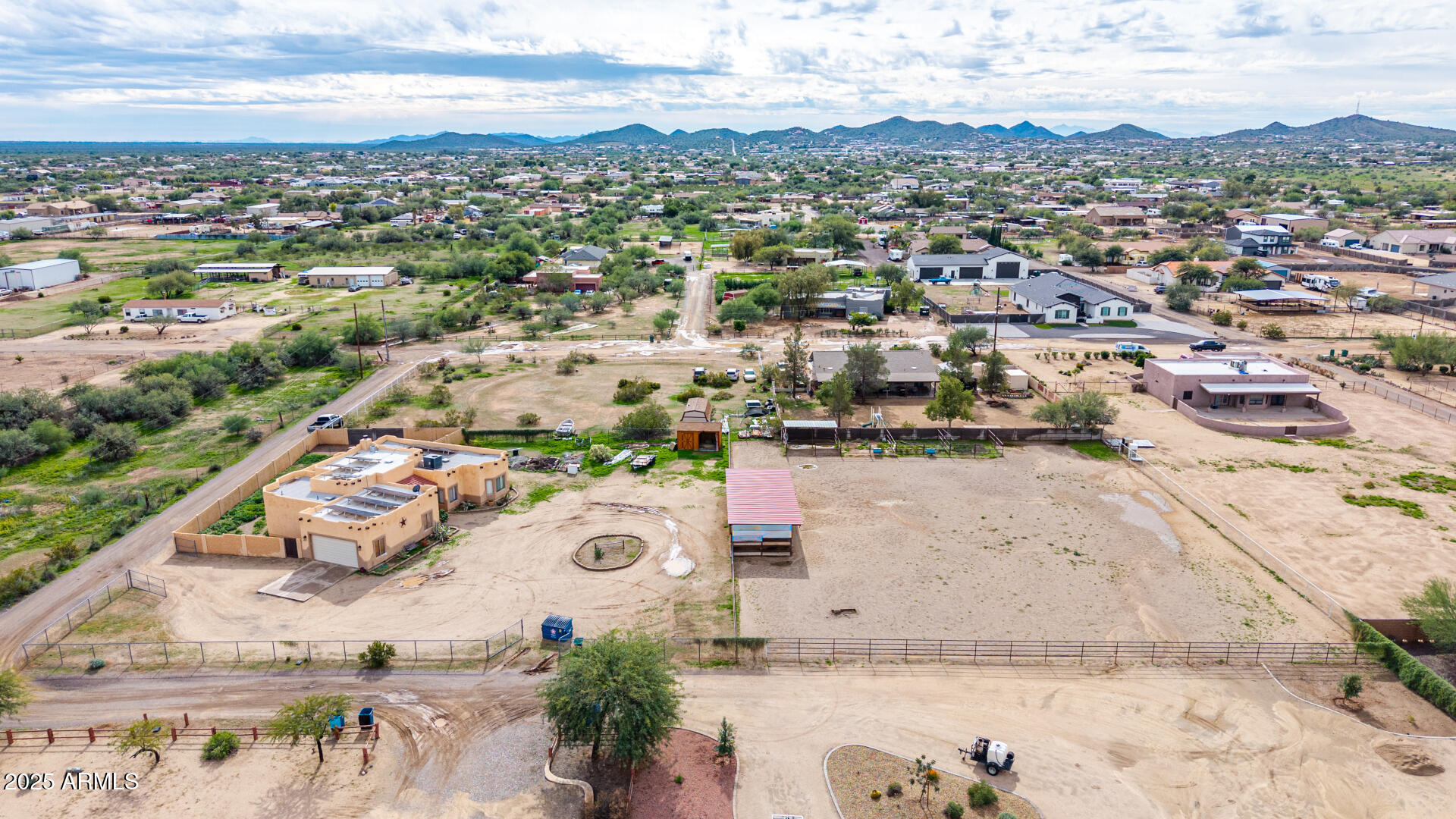 1032 East Carlise Road Phoenix, AZ 85086 - Photo 50 of 56 an aerial view of a house with a mountain