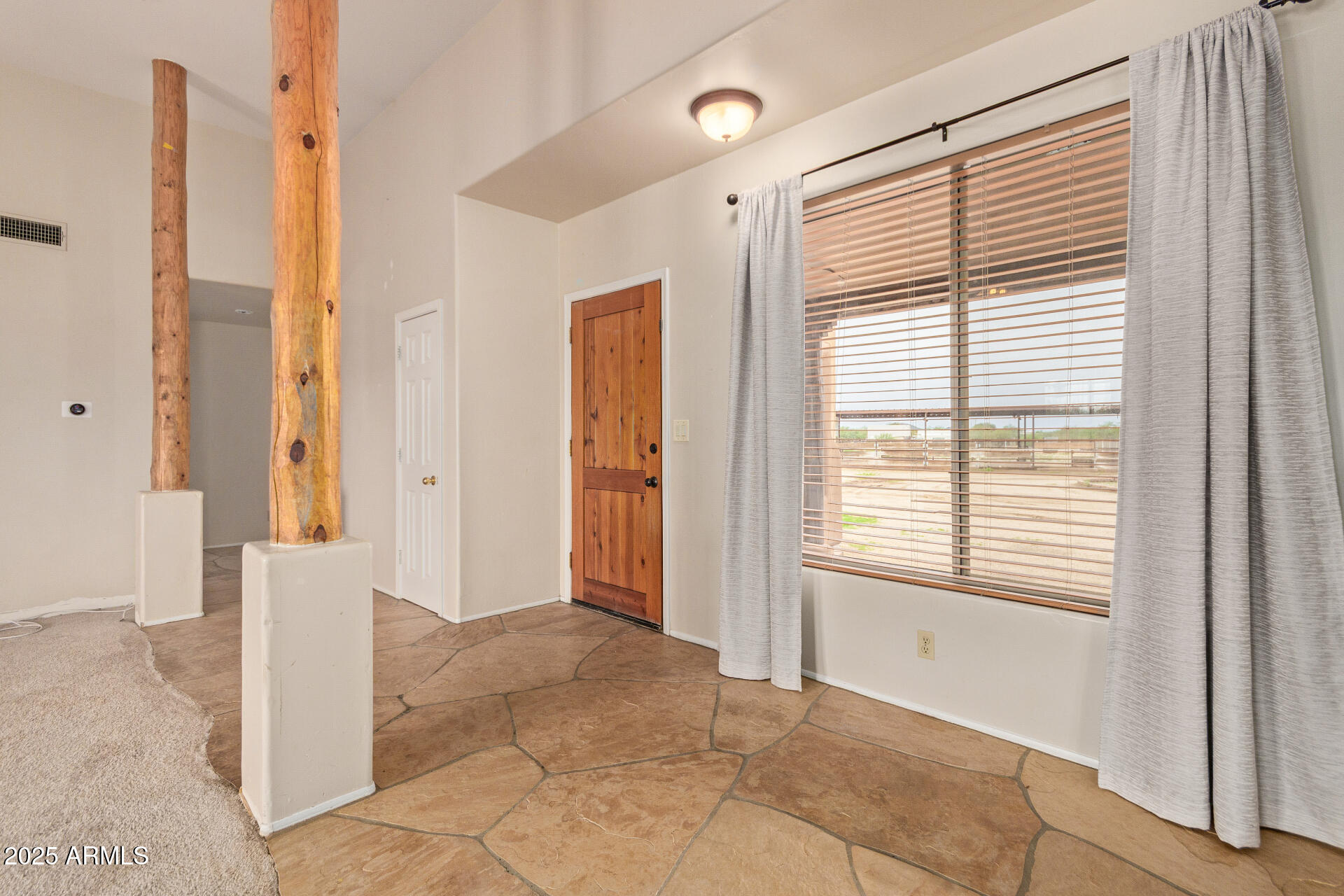 1032 East Carlise Road Phoenix, AZ 85086 - Photo 8 of 56 a view of a room with a large window