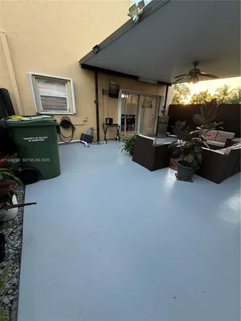 a view of a backyard with plants