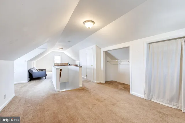 a view of a livingroom and a chandelier