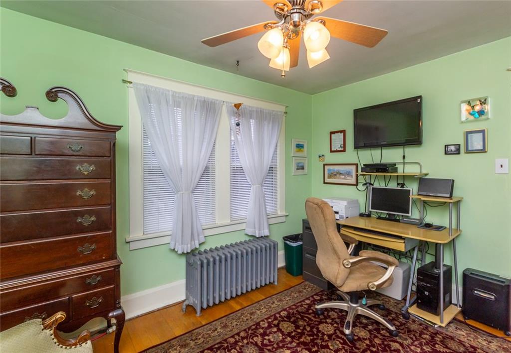 644 Cascade Road Pittsburgh, PA 15221 - Photo 15 of 21 a workspace with furniture and a window