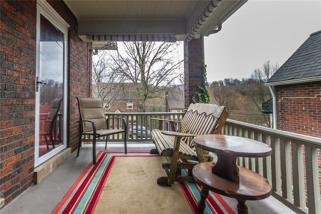 644 Cascade Road Pittsburgh, PA 15221 - Photo 18 of 21 a view of a chairs and table in the balcony