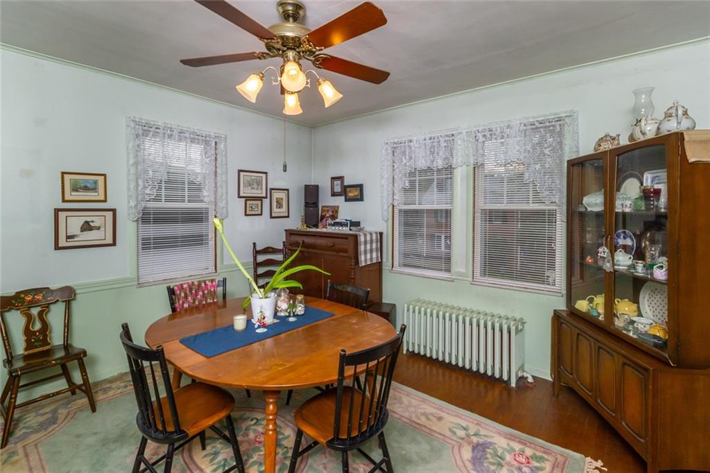 644 Cascade Road Pittsburgh, PA 15221 - Photo 7 of 21 a dining room with furniture and window