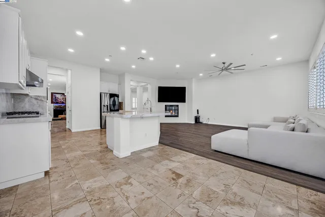 a view of a room with window and furniture