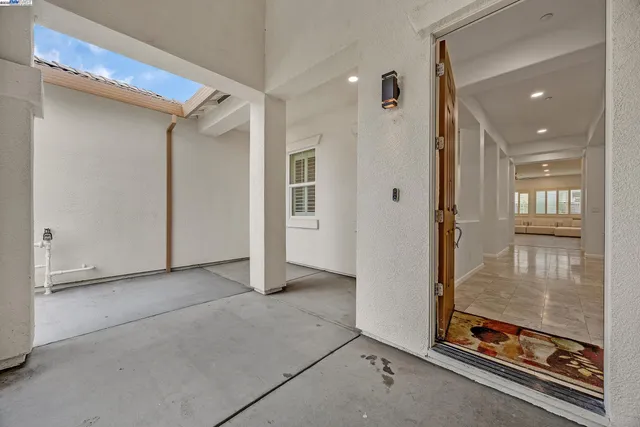 a view of a livingroom with furniture and a fireplace