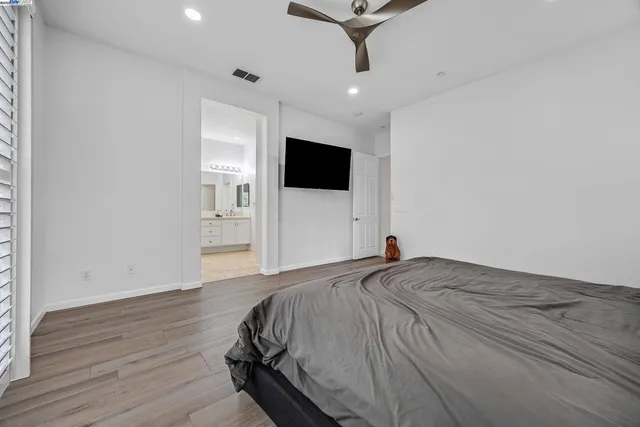 a white bath tub sitting next to a window