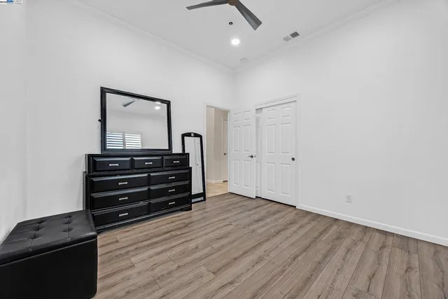 a view of house with backyard and a garden