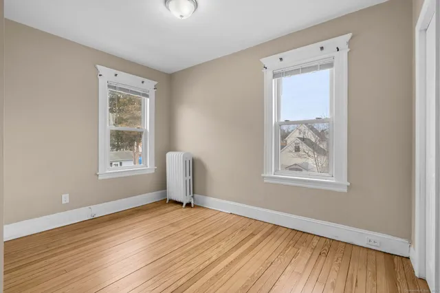 a bathroom with a sink a toilet and bathtub