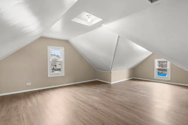 a view of a door and a window