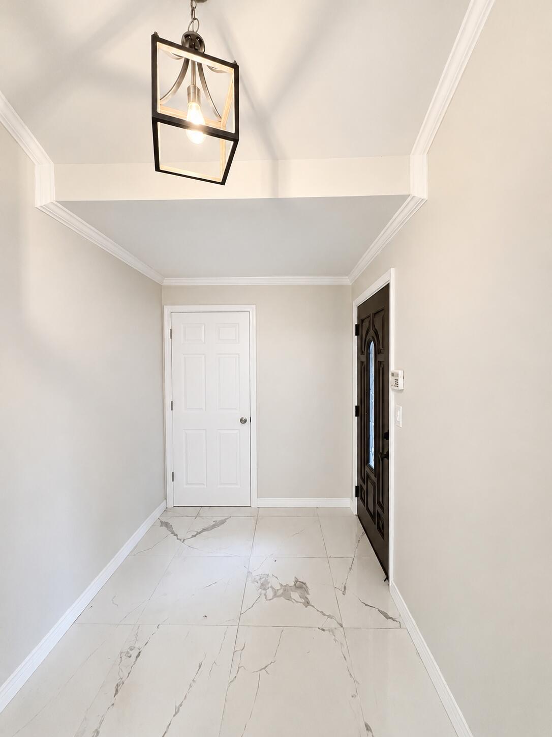 2612 Amsterdam Road Villa Hills, KY 41017 - Photo 6 of 52 ENTRY WAY FEATURING MARBLE FLOORING AND ACCESS TO THE 2 CAR GARAGE WITH PLENTY OF STORAGE - FLEX SPACE