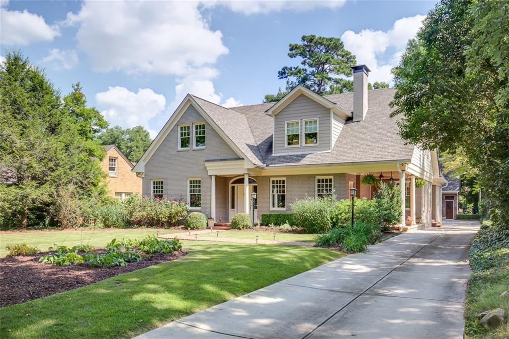 561 Ridgecrest Road Northeast Atlanta, GA 30307 - Photo 1 of 1 a front view of house with yard and green space