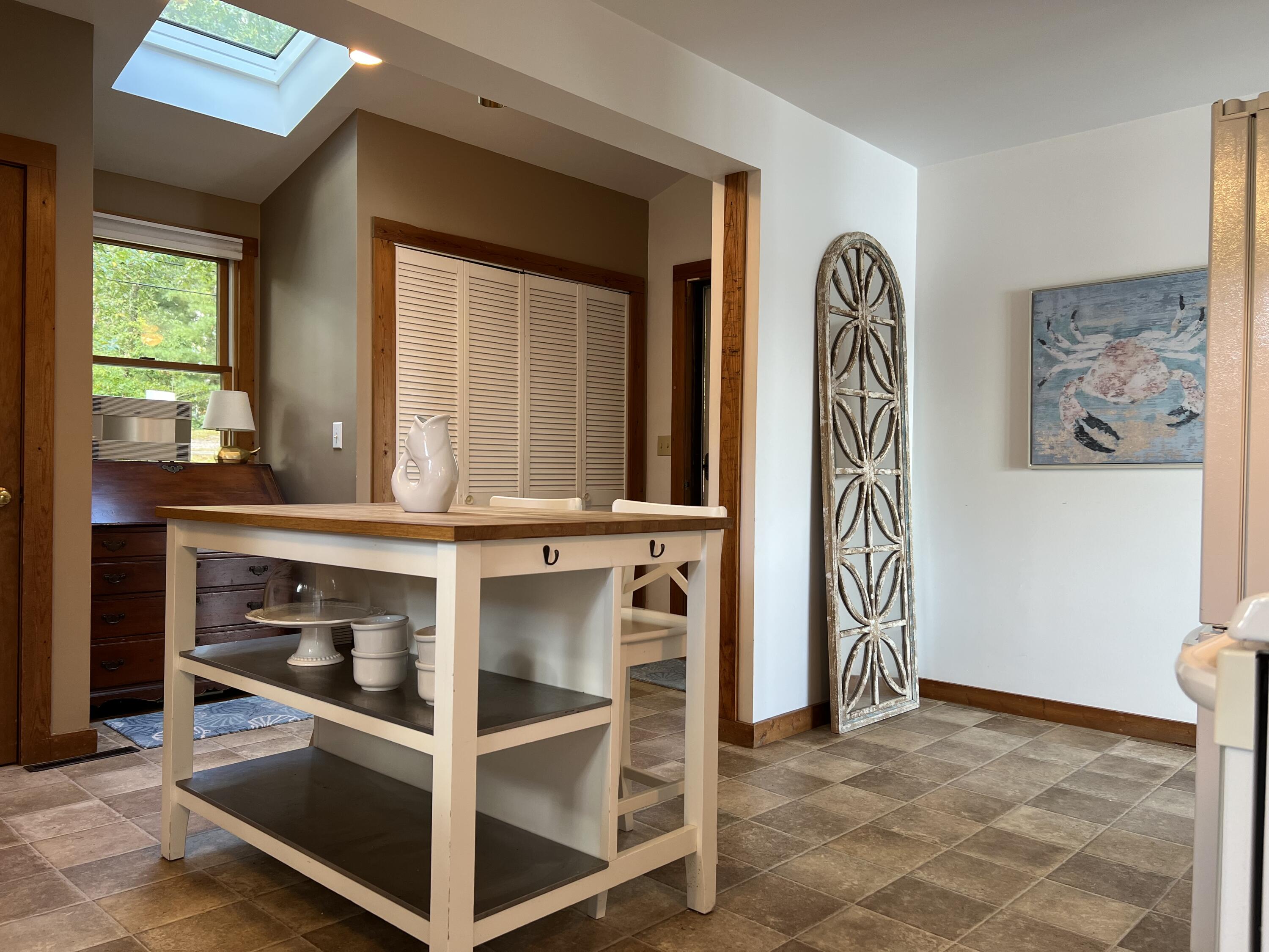 72 Captains Row Mashpee, MA 02649 - Photo 18 of 40 a view of front door with furniture