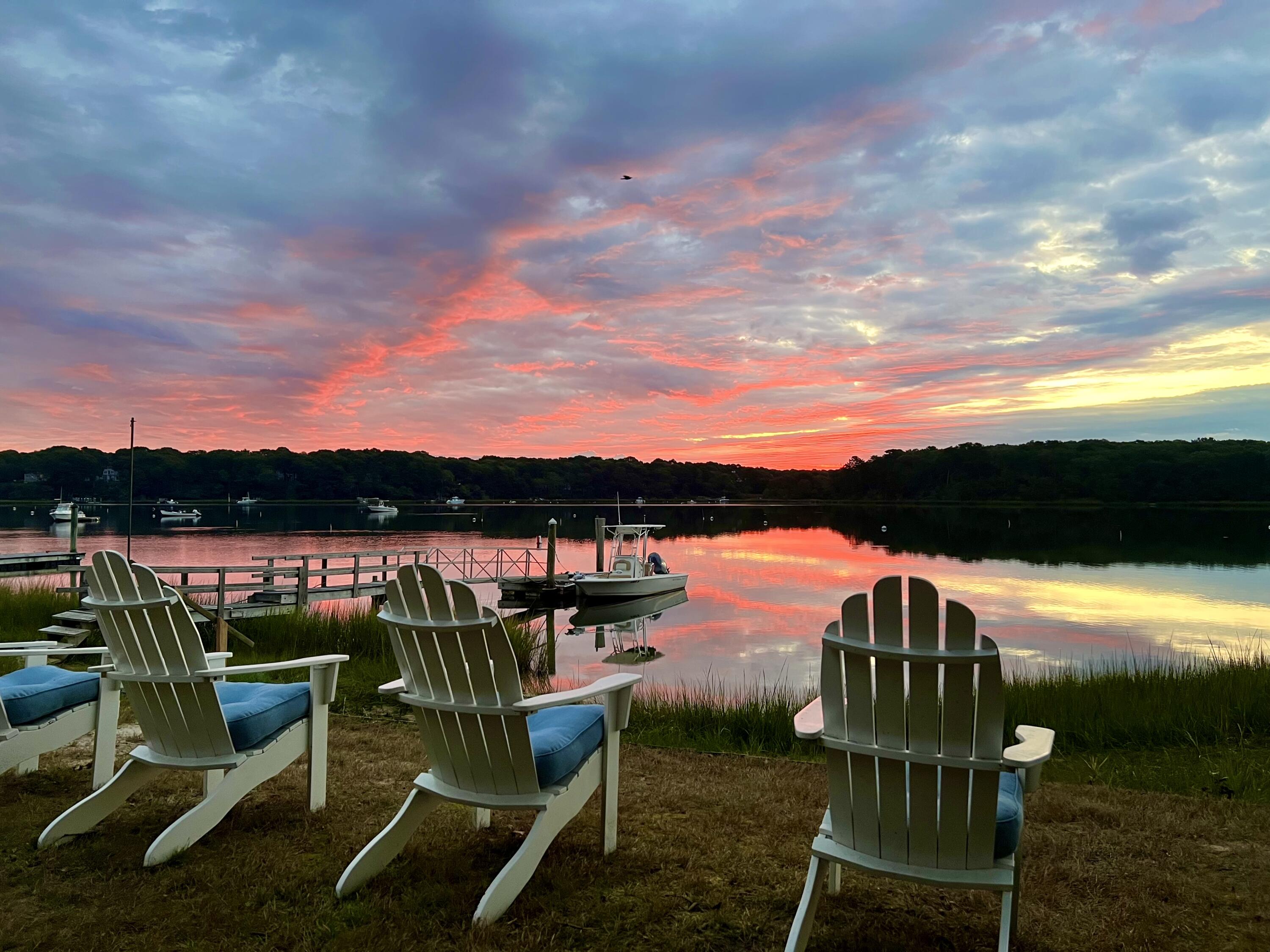 72 Captains Row Mashpee, MA 02649 - Photo 34 of 40 a view of a chairs and table in patio