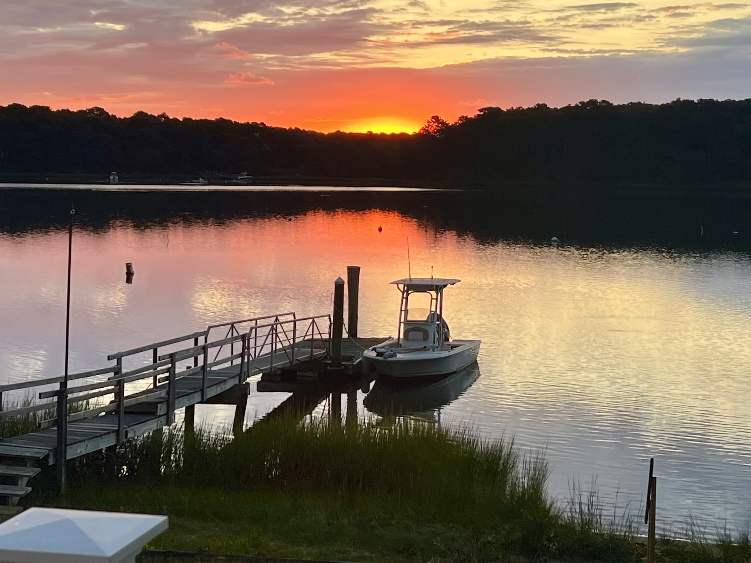 72 Captains Row Mashpee, MA 02649 - Photo 36 of 40 a view of a lake from a city