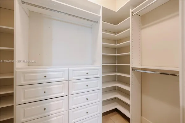 a view of an empty walk in closet