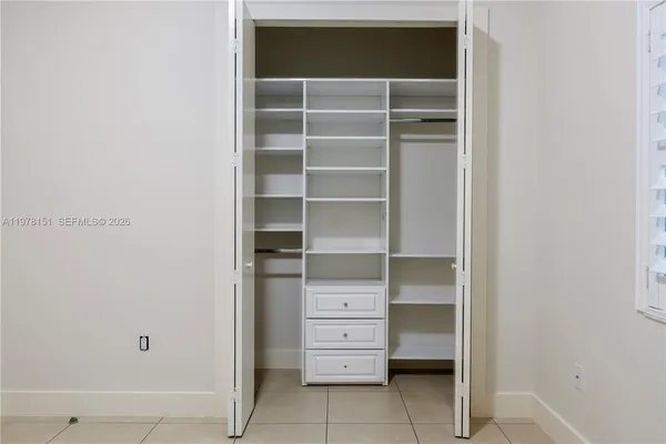 a view of a backyard with a garden