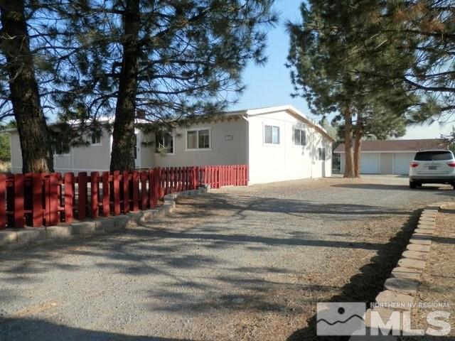 17640 Cold Springs Drive Reno, NV 89508 - Photo 1 of 1 a front view of a house with a tree