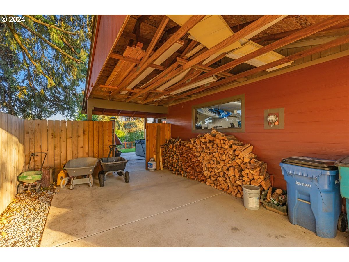 16507 Northeast 30th Court Ridgefield, WA 98642 - Photo 42 of 48 a bed room with a bed and a chair