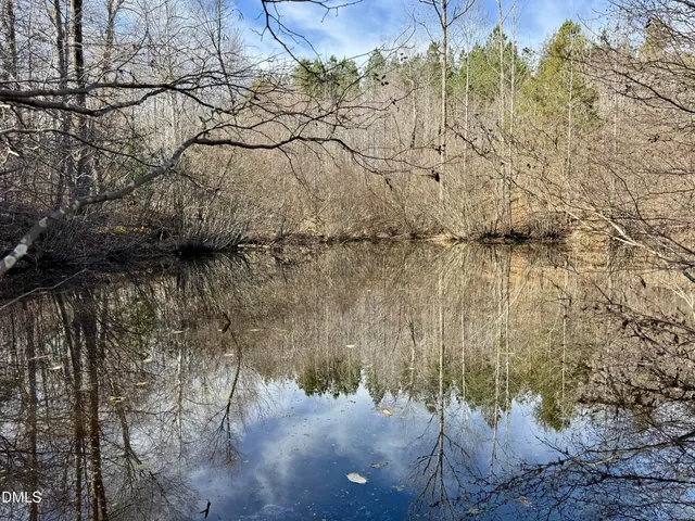 a view of a yard next to a building