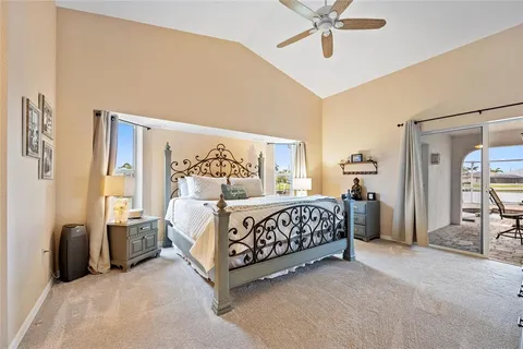 a bed room with a bed and a couch