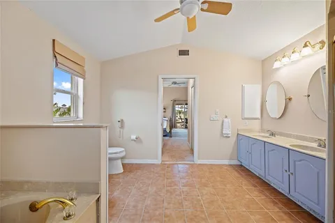 a bedroom with a bed furniture and a window