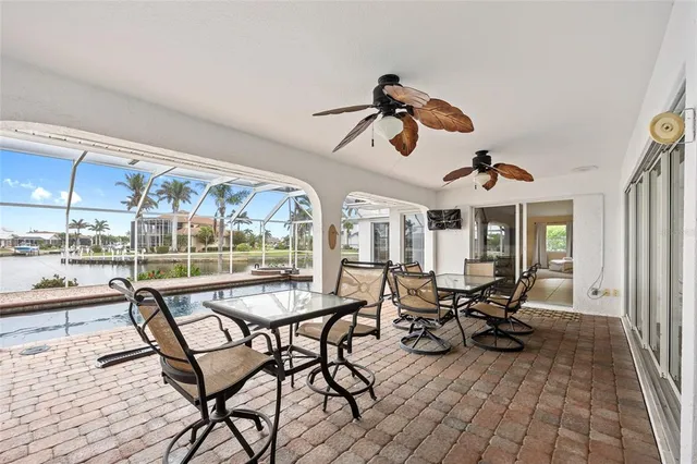 a swimming pool with view of seating area