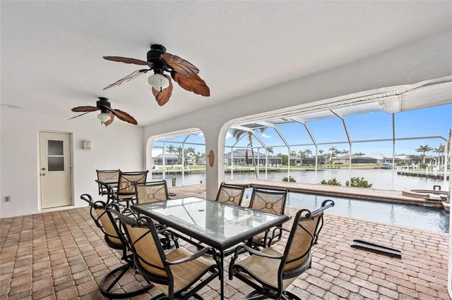 a view of a swimming pool with a porch