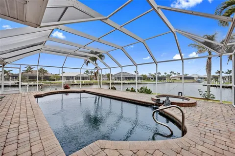a view of outdoor space and swimming pool