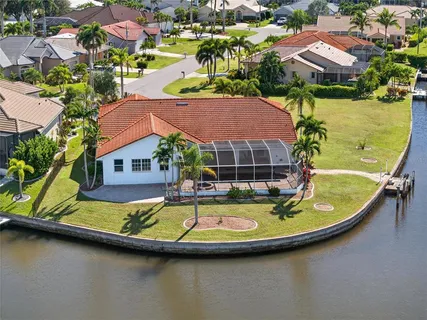 a view of a swimming pool with an ocean view