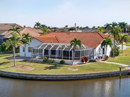 a view of a lake with a house