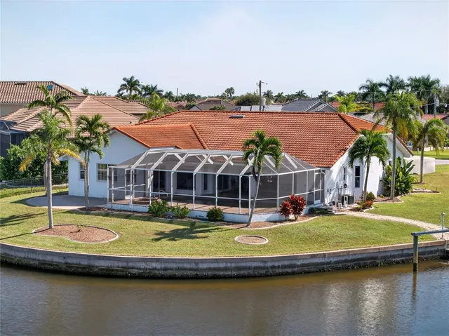 a view of a lake with a house