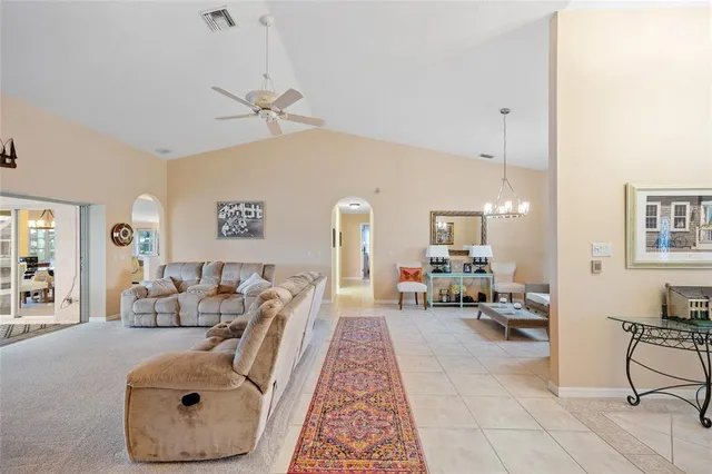 a living room with furniture and a table