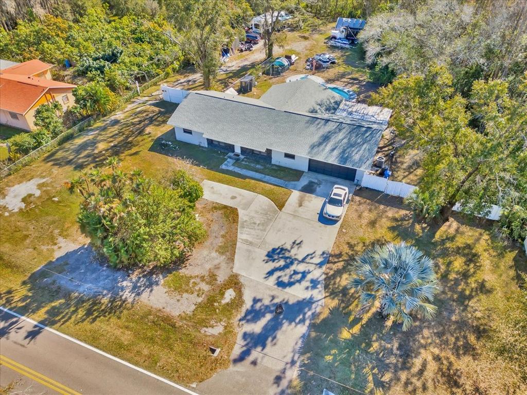 6124 Lynn Road Tampa, FL 33625 - Photo 11 of 84 an aerial view of a house with a yard